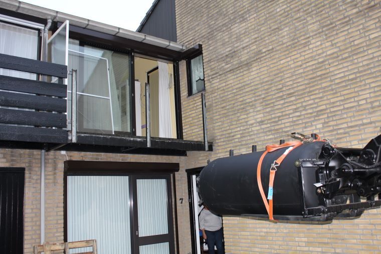 Verreiker met daarop 1000 liter buffervat 2.