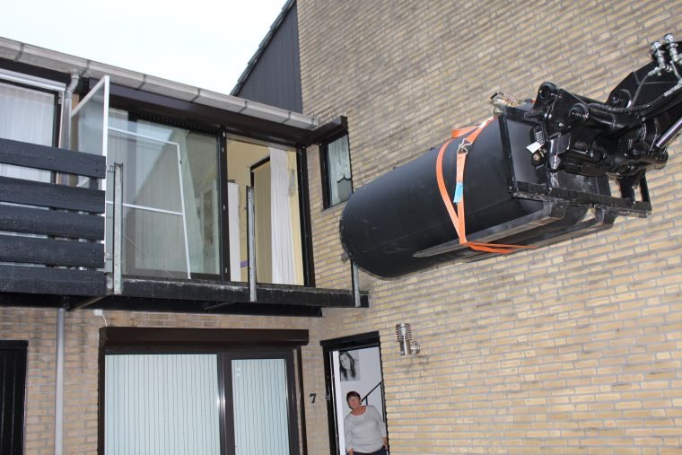 Verreiker met daarop 1000 liter buffervat 3